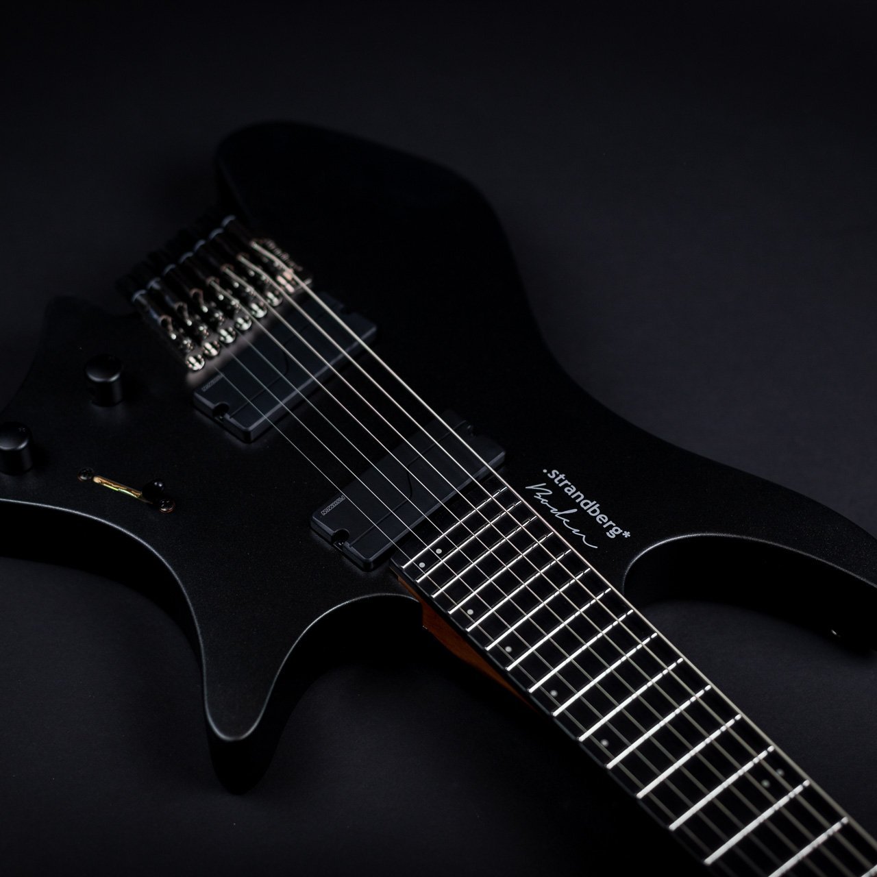 Headless guitar boden metal black 8 string front view