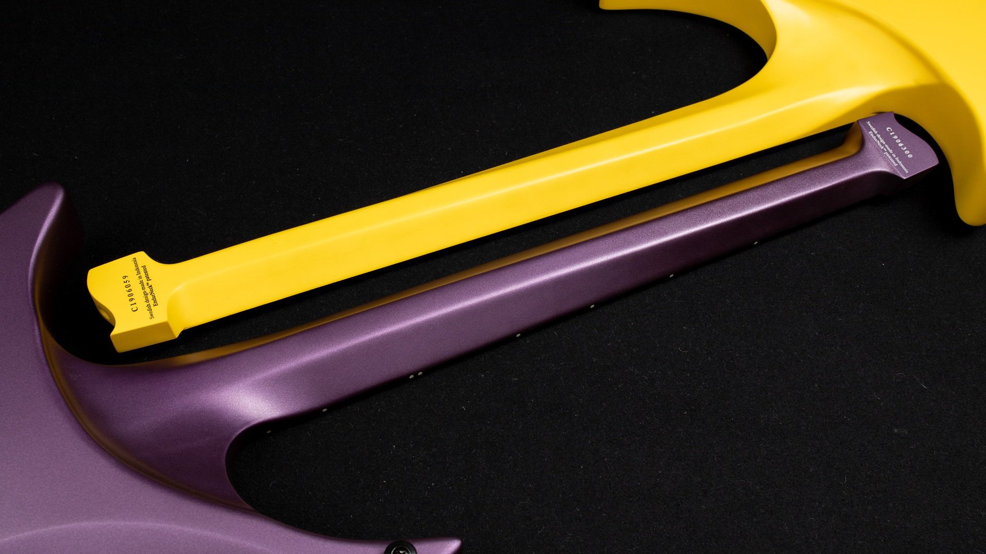 Headless Guitar Boden Metal purple and yellow closeup neck