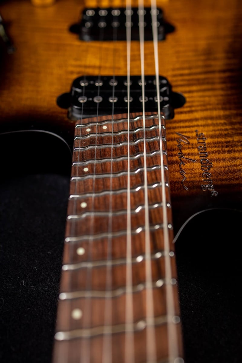 True Temperament brown burst 6 string headless guitar fretboard